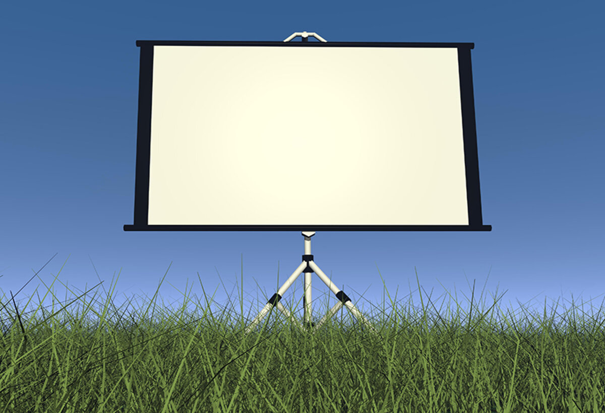 Dia-Leinwand auf Wiese